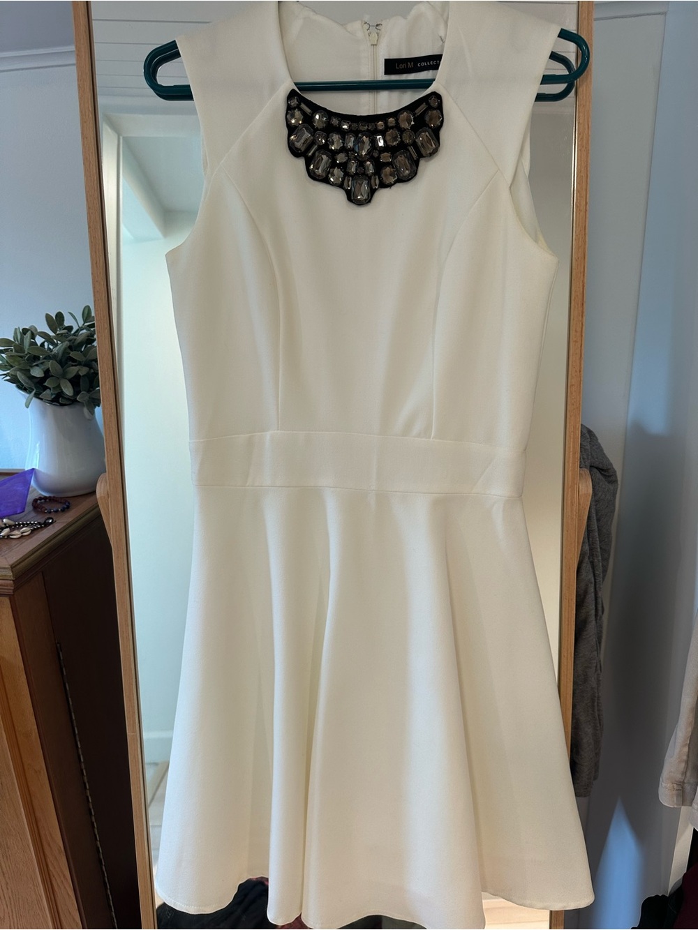 White Sleeveless Fit & Flare Dress with Embellished Neckline -